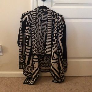 Cartigan sweater. Black patterned